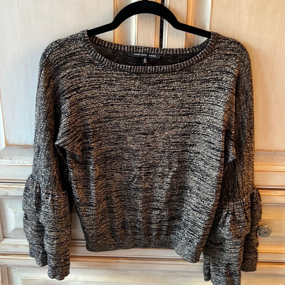Black and gold statement sleeve sweater